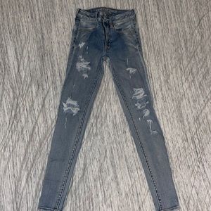 American Eagle Super Super Stretch, Ripped Faded Blue Jean, Size 2